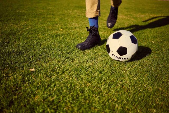 Playing-soccer-at-the-park-900×600